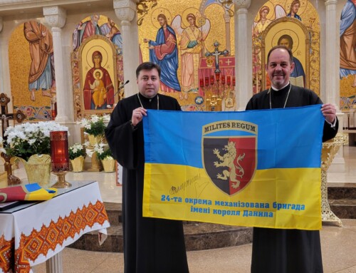 Rector of Lviv Church Presents Bishop with Ukrainian Flag and Certificate for War Relief Efforts